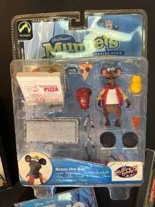 lot 172 image: game CDs RollerCoaster Tycoon, The Sims, Big Game Hunter, Atari, Finding Nemo  Wild Planet Supersonic Ear 2, Top Hat game, & Jim Hensons Muppets Series 4s Rizzo the Rat (unopened)