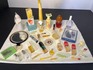 lot 180 image: assorted mainly vintage beauty products Calvin Klein, Max Factor, Elizabeth Arden, Avon, Jergens  hand mirror & vintage hair pins