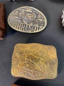 lot 182 image: lots of belts & buckles  Mickey Mouse, Red Wing Shoes, Winnie the Pooh, Winchester, Operating Engineers Union & more