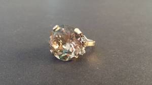 lot 86 image: 10K gold ring w large glass amber-colored stone & likely (not guaranteed) 4 small diamonds