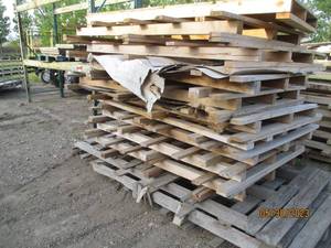 lot 5 image: Stack of large hardwood pallets for...