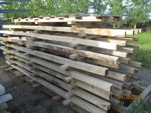 lot 6 image: Stack of large hardwood pallets for...