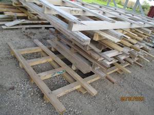 lot 8 image: Stack of large hardwood pallets for...