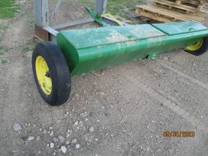 lot 9 image: Seed spreader measuring 10 across...