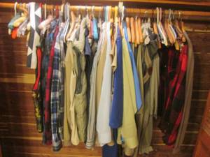lot 63 image: Closet of Clothes and Hangers