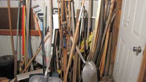 lot 804 image: Entire wall of various yard work tools