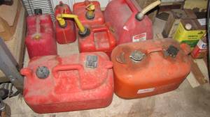 lot 807 image: 5 Regular Gas Cans - 4 One Gallon, ...