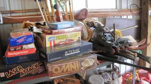 lot 815 image: Shelf full of vintage games. Yards ...