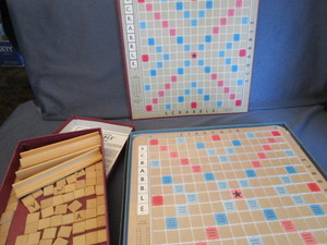 lot 69 image: Scrabble Game & Swivel Table