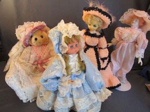 lot 100 image: Dolls & Wicker Chair