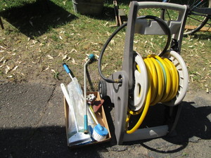 lot 114 image: Garden Hose & Cart