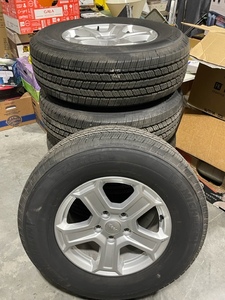 lot 1 image: 2020 Jeep Wrangler Sport New Take Off Rims and Tires with Spare