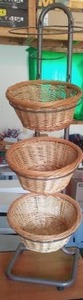 lot 24 image: Wicker And Metal Display Stand.