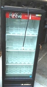 lot 66 image: Coke, Single Door Cooler. Includes Can Sliders. Fabulous for any purpose