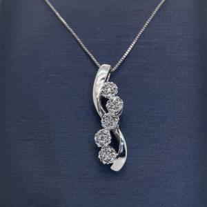 lot 21A image: Diamond Journey Cluster Ribbon Symphony Pendant in White Gold, Stunning Illusion Miracle Setting $1,199 Retail