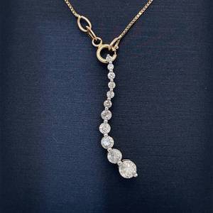 lot 25A image: Classic Elegance 0.50 Carat Diamond Round Brilliant Cut Graduated Size Journey Pendant in Yellow Gold $1,500 Retail