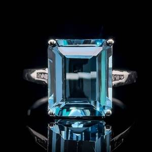 lot 27 image: Southern Estate Find Big & Bold Emerald Cut Blue Topaz Solitaire & Diamond Accent Ring in White Gold $1.899 Retail VIDEO