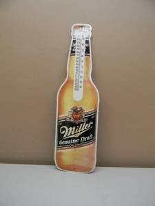 lot 47 image: VINTAGE MILLER GENUINE DRAFT BOTTLE TIN SIGN - NICE - GREAT PIECE - APPROX 9 By 30 - SEE PICTURES