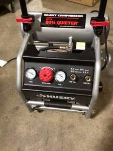 lot 11 image: Husky 4.5 Gal. Portable Electric-Powered Silent Air Compressor Customer Returns See Pictures