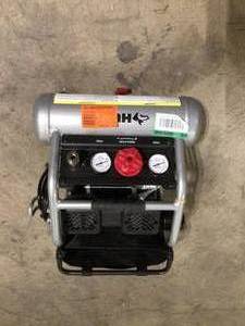 lot 22 image: Husky 1 Gal. Portable Electric-Powered Silent Air Compressor    Customer Returns See Pictures