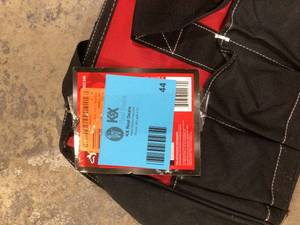 lot 44 image: Husky 24 in. 16 Pocket Zippered Tool Bag  Customer Returns See Pictures