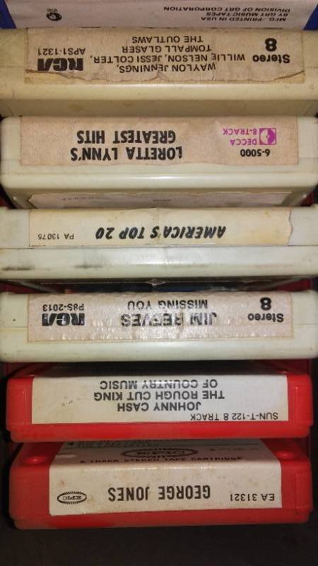 lot 260X image: 8 track tapes and car case.