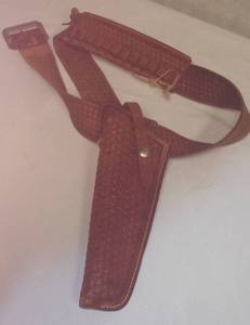 lot 118 image: Lawrence leather Holster, Belt, and cartridge Holder.