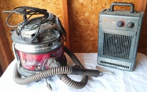 lot 157 image: Honey Well Heater And Canister Vacuum.