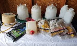 lot 181 image: Farming Lot. See Pics.  Chicken Feeders, Water Heater, Insulators, Nursing Bottles, Ear Tags