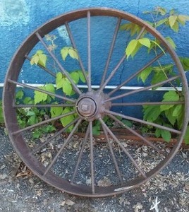 lot 67 image: Vintage Iron Wheel.