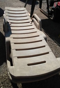 lot 55 image: Resin Outdoor Recliner Lounger (2)