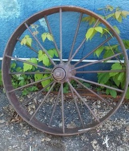lot 66 image: Vintage Iron Wheel.