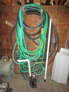 lot 54 image: Garden Hose, Sump Pump & Hose