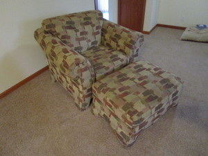 lot 81 image: Chair & Ottoman