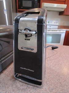 lot 95 image: Electric Can Opener & 4 Slice Toaster