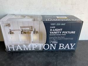 lot 69 image: Hampton Bay Cade 3-Light 20.25 in. Brushed Nickel Transitional Hardwired Bathroom Vanity Light with Frosted Glass Shades