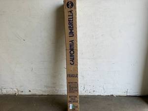 lot 14 image: California Umbrella 9 ft. Bronze Aluminum Pole Market Aluminum Ribs Auto Tilt Crank Lift Patio Umbrella in Sunflower Yellow Sunbrella