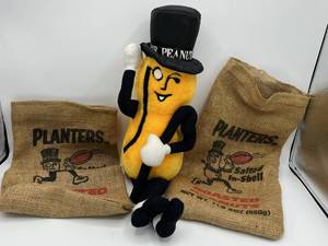 lot 4 image: Vintage Planters Peanuts Mr. Peanut 18 Plush Figure with (2) Vintage Planters Peanuts Burlap Sacks (Football Theme)