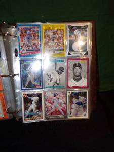 lot 204 image: Binder Full of Baseball Stars (Brett, Ripken, Gwynn, Griffey JR, Henderson)