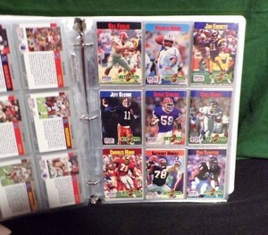 lot 212 image: Assortment of Baseball, Football, MovieTV and Motorcycle Cards