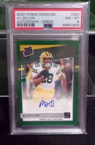 lot 188 image: 2020 Panini Donruss AJ Dillon Autograph - Green #324 PSA 8 NM-MT RC