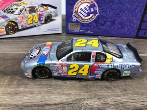 lot 40 image: 2000 Nascar Action Racing Collectibles Jeff Gordon Monte Carlo #24 DuPont  Nascar 2000 124 scale die cast stock car
