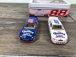 lot 44 image: 1999 Nascar Action Dale Jarrett Ford Taurus #88  Quality Care 2 car set 164 scale die cast stock cars