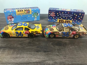 lot 52 image: 1999 Nascar Racing Champions Ernie Irvan #36  M&Ms 2 car set 124 scale die cast