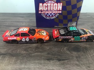 lot 53 image: 1998 Nascar Racing Action Platinum Series Collectibles Tony Stewart #44 & Bobby Labonte #18  Small Soldiers 2 car set 132 scale die cast stock cars