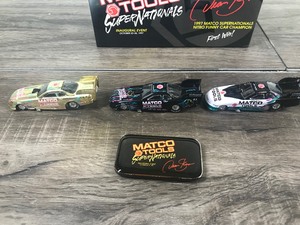 lot 54 image: 1997 NHRA Racing Champions  Matco Tools Dean Skuza 3 car set world champion 164 scale die cast funny cars