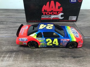 lot 80 image: 1997 Nascar Mac Tools Motor Sports Jeff Gordon Monte Carlo #24  DuPont Million Dollar Date 124 scale die cast coin bank stock car