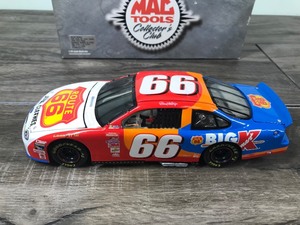 lot 82 image: 1999 Nascar Mac Tools Collectors Club Darrell Waltrip Ford Taurus #66  Route 66 Jeans Clothes 124 scale die cast stock car
