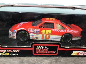 lot 99 image: 1992 Nascar Racing Champions Wally Dallenbach Jr. Ford Taurus #16  Roush Racing 124 scale die cast stock car