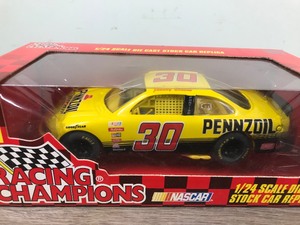 lot 103 image: 1997 Nascar Racing Champions Johnny Benson Pontiac #30  Pennzoil 124 scale die cast stock car